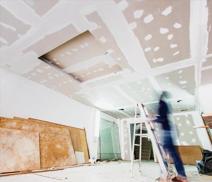 A construction site with new drywall installed